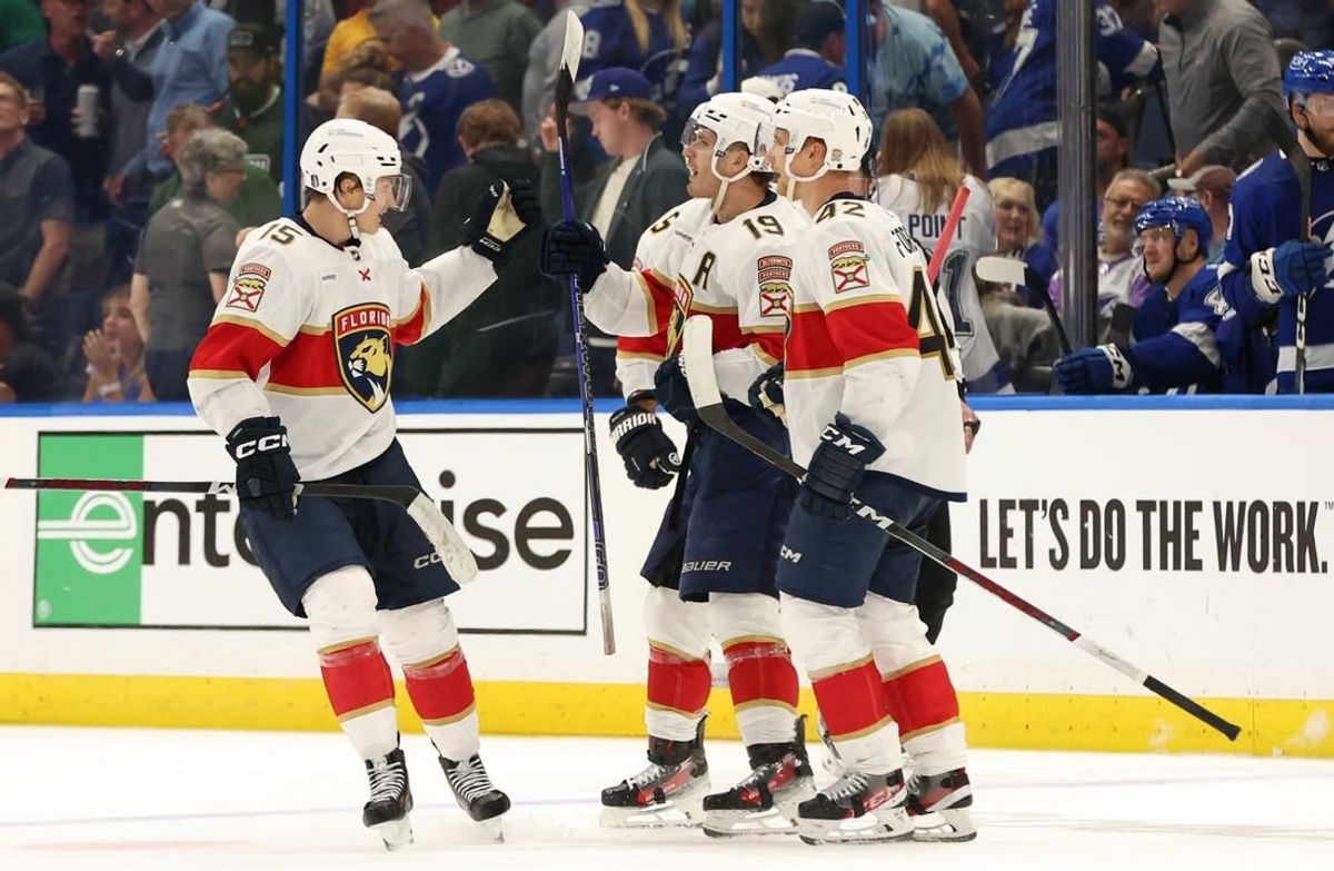 Apr 25, 2024; Tampa, Florida, USA; Florida Panthers left wing Matthew Tkachuk (19) is congratulated by center Anton Lundell (15) and defenseman Gustav Forsling (42) after he scored a goal against the Tampa Bay Lightning during the third period in game three of the first round of the 2024 Stanley Cup Playoffs at Amalie Arena.