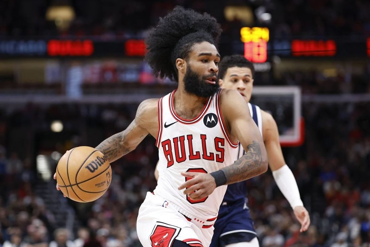 Mar 11, 2024; Chicago, Illinois, USA; Chicago Bulls guard Coby White (0) drives to the basket against the Dallas Mavericks during the first half at United Center.