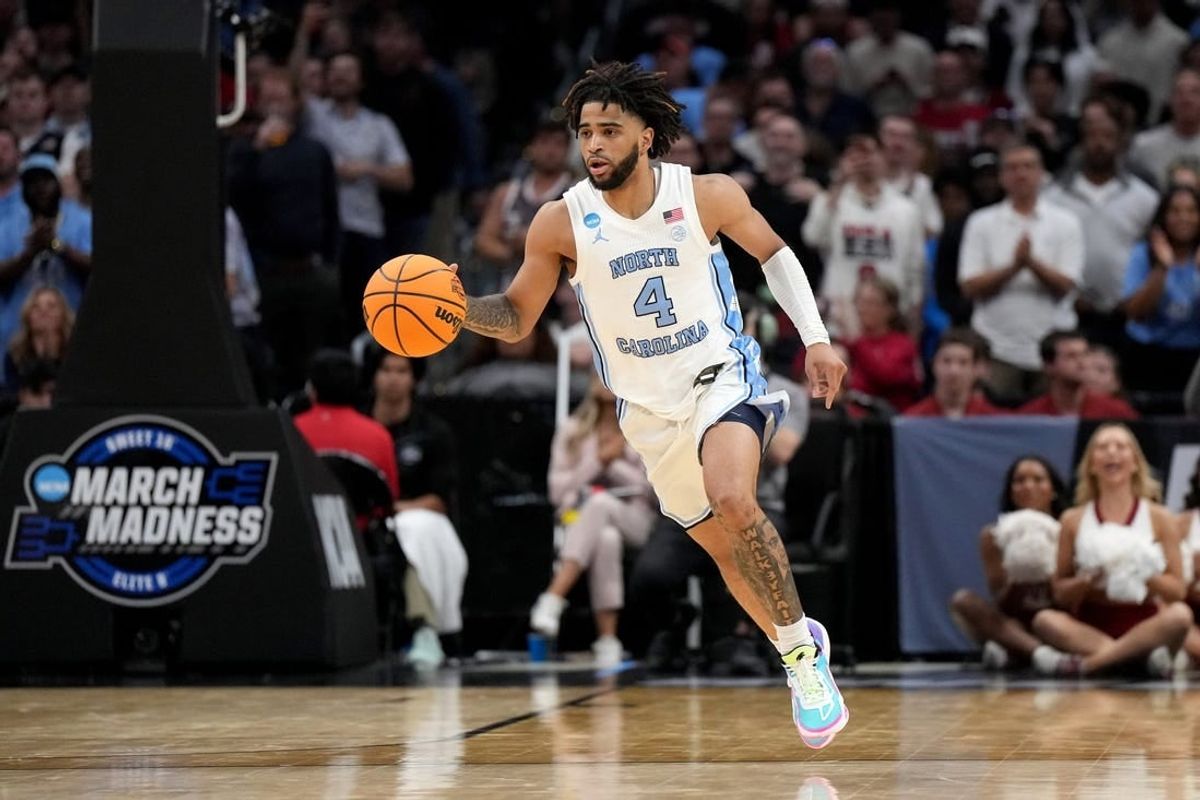 Mar 28, 2024; Los Angeles, CA, USA; North Carolina Tar Heels guard RJ Davis (4) controls the ball in the second half against the Alabama Crimson Tide in the semifinals of the West Regional of the 2024 NCAA Tournament at Crypto.com Arena.