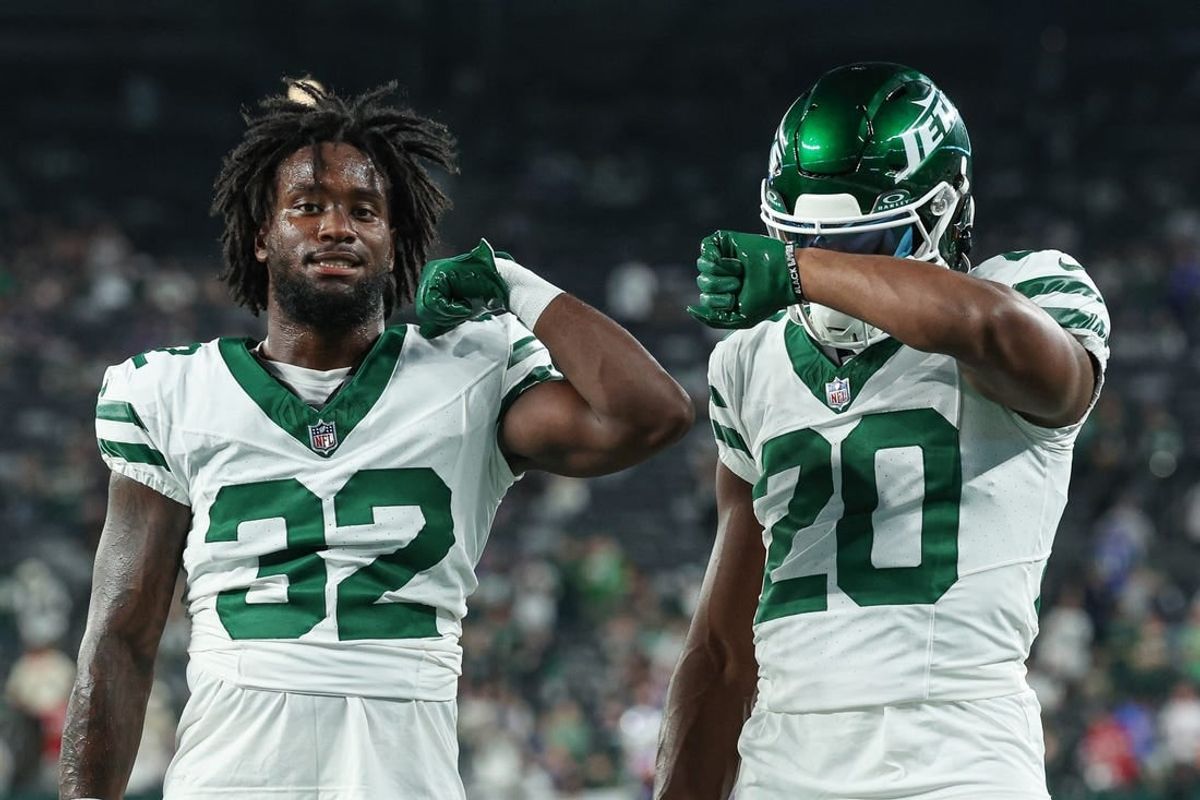 Sep 11, 2023; East Rutherford, New Jersey, USA; New York Jets running back Michael Carter (32) and running back Breece Hall (20) pose for a photo before the game against the Buffalo Bills at MetLife Stadium.