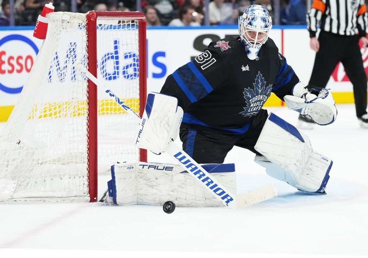 Dec 27, 2023; Toronto, Ontario, CAN; Toronto Maple Leafs goaltender Martin Jones (31) handles the puck against the Ottawa Senators during the second period at Scotiabank Arena.