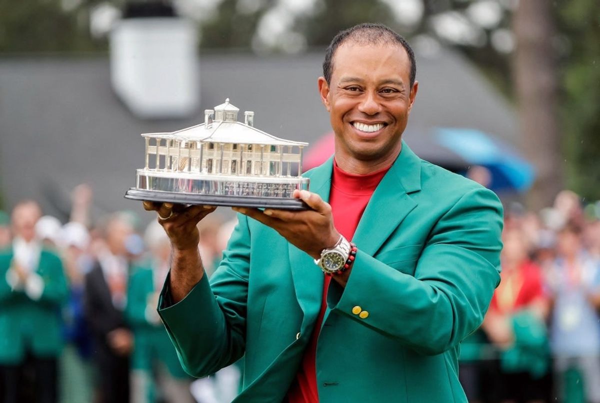 Tiger Woods celebrates during the trophy presentation after winning the Masters Tournament at Augusta National Golf Club, Sunday, April 14, 2019, in Augusta, Georgia. [ALLEN EYESTONE/FOR THE AUGUSTA CHRONICLE]