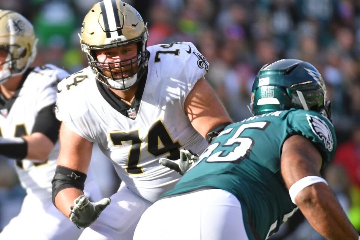 Jan 1, 2023; Philadelphia, Pennsylvania, USA; New Orleans Saints offensive tackle James Hurst (74) blocks against the Philadelphia Eagles at Lincoln Financial Field.
