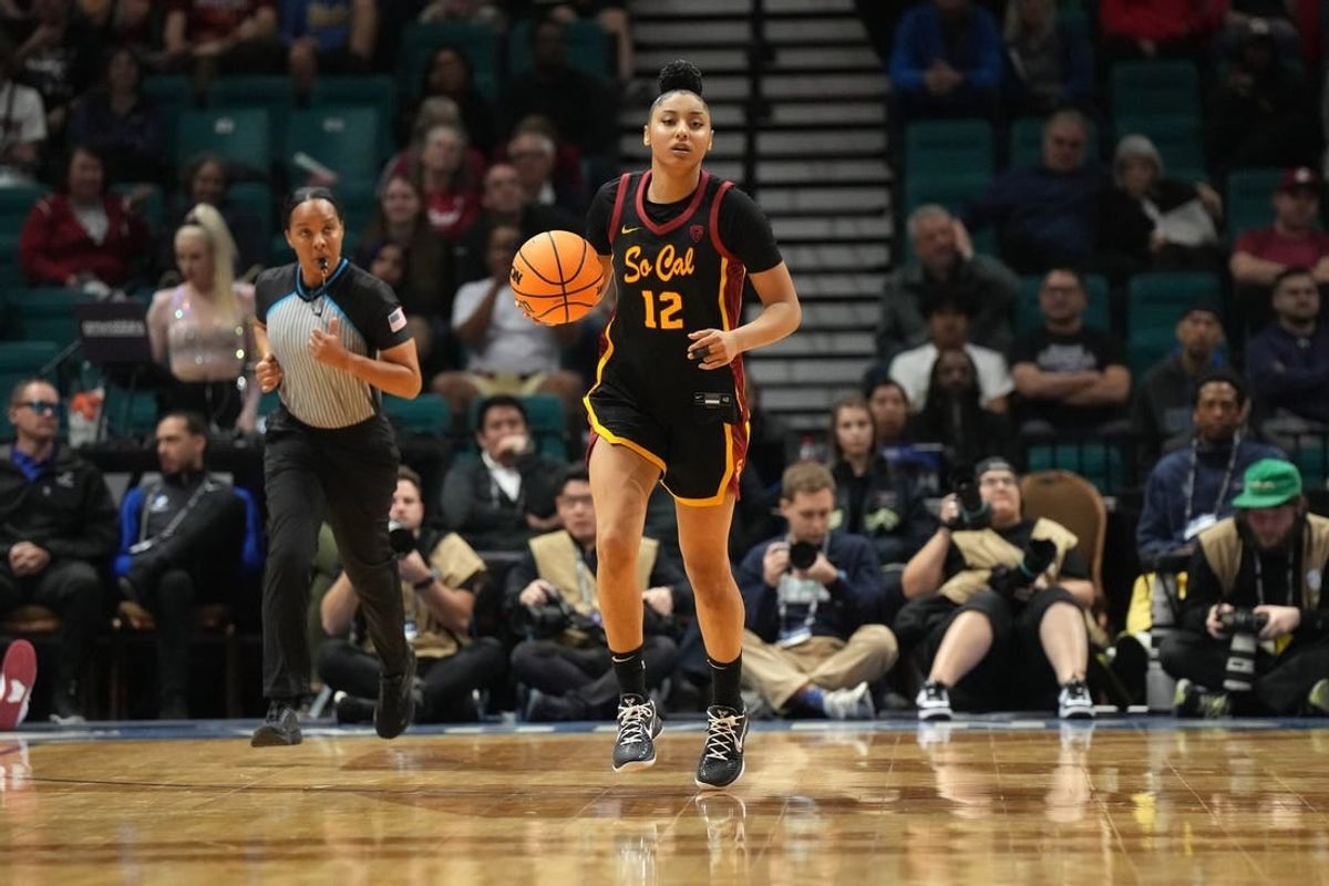 Mar 10, 2024; Las Vegas, NV, USA; Southern California Trojans guard JuJu Watkins (12) dribbles the ball against the Stanford Cardinal in the second half of the Pac-12 Tournament women's championship game at MGM Grand Garden Arena.