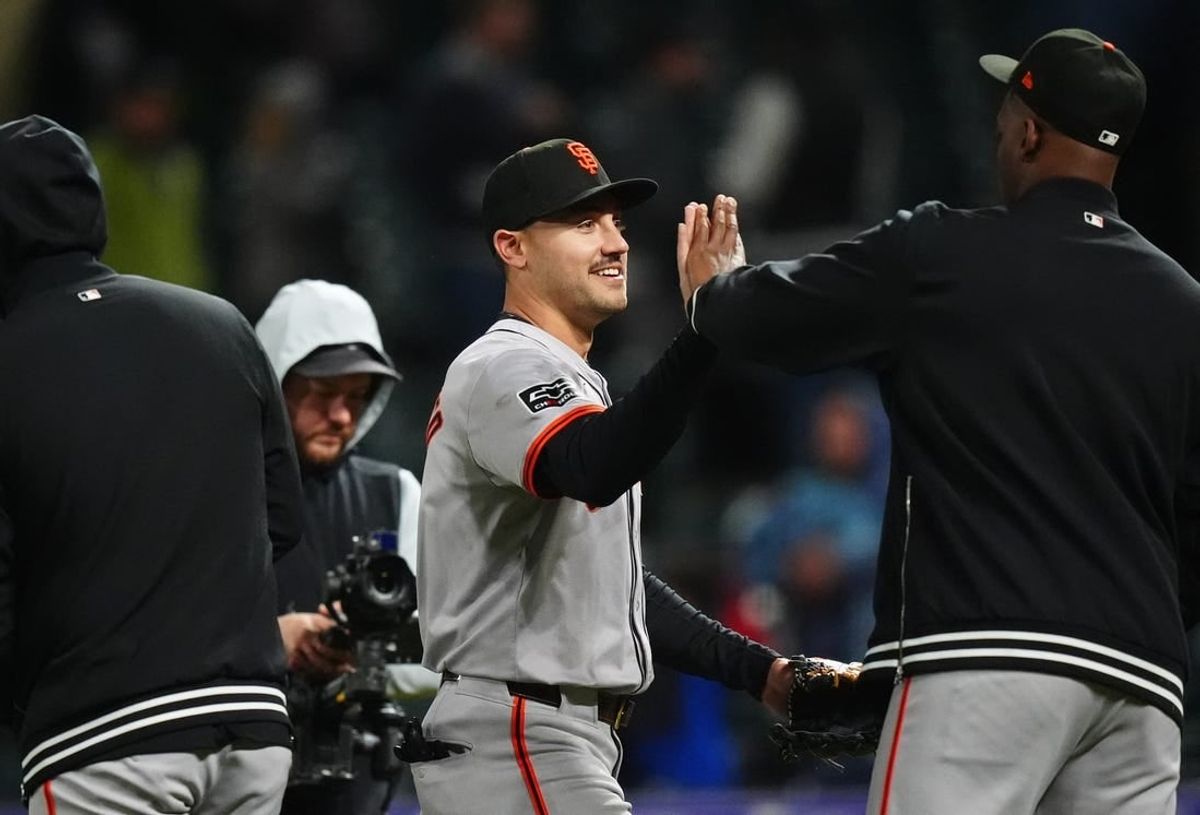 May 8, 2024; Denver, Colorado, USA; San Francisco Giants left fielder Michael Conforto (8) celebrates following the win over the Colorado Rockies at Coors Field.