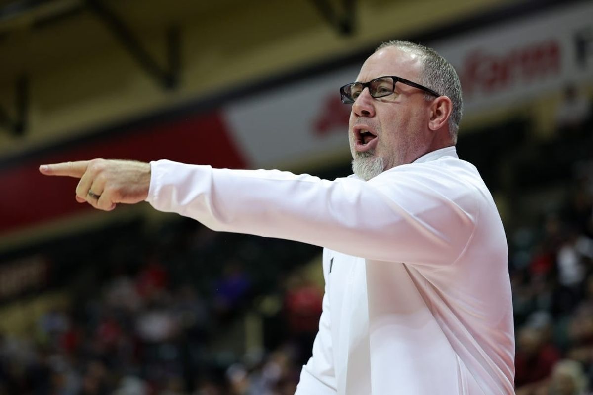 Nov 24, 2023; Kissimmee, FL, USA;  Texas A&M Aggies head coach Buzz Williams calls to his team against the Florida Atlantic Owls in the first half during the ESPN Events Invitational Semifinals at State Farm Field House.