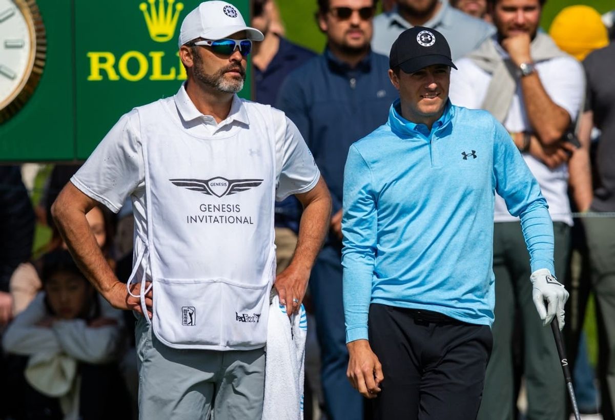Feb 15, 2024; Pacific Palisades, California, USA; Jordan Spieth and his caddie on the tenth hole during the first round of The Genesis Invitational golf tournament.