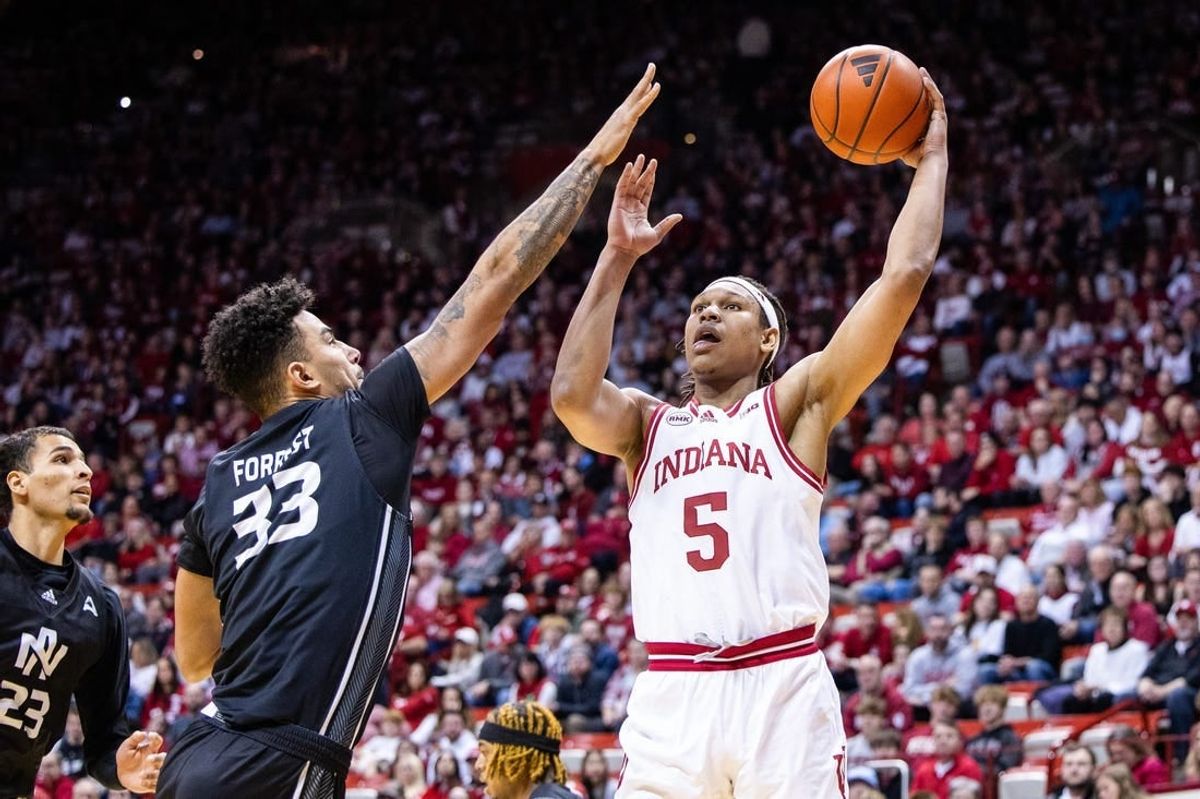 Dec 21, 2023; Bloomington, Indiana, USA; Indiana Hoosiers forward Malik Reneau (5) shoots the ball while North Alabama Lions forward Damian Forrest (33) defends in the first half at Simon Skjodt Assembly Hall.