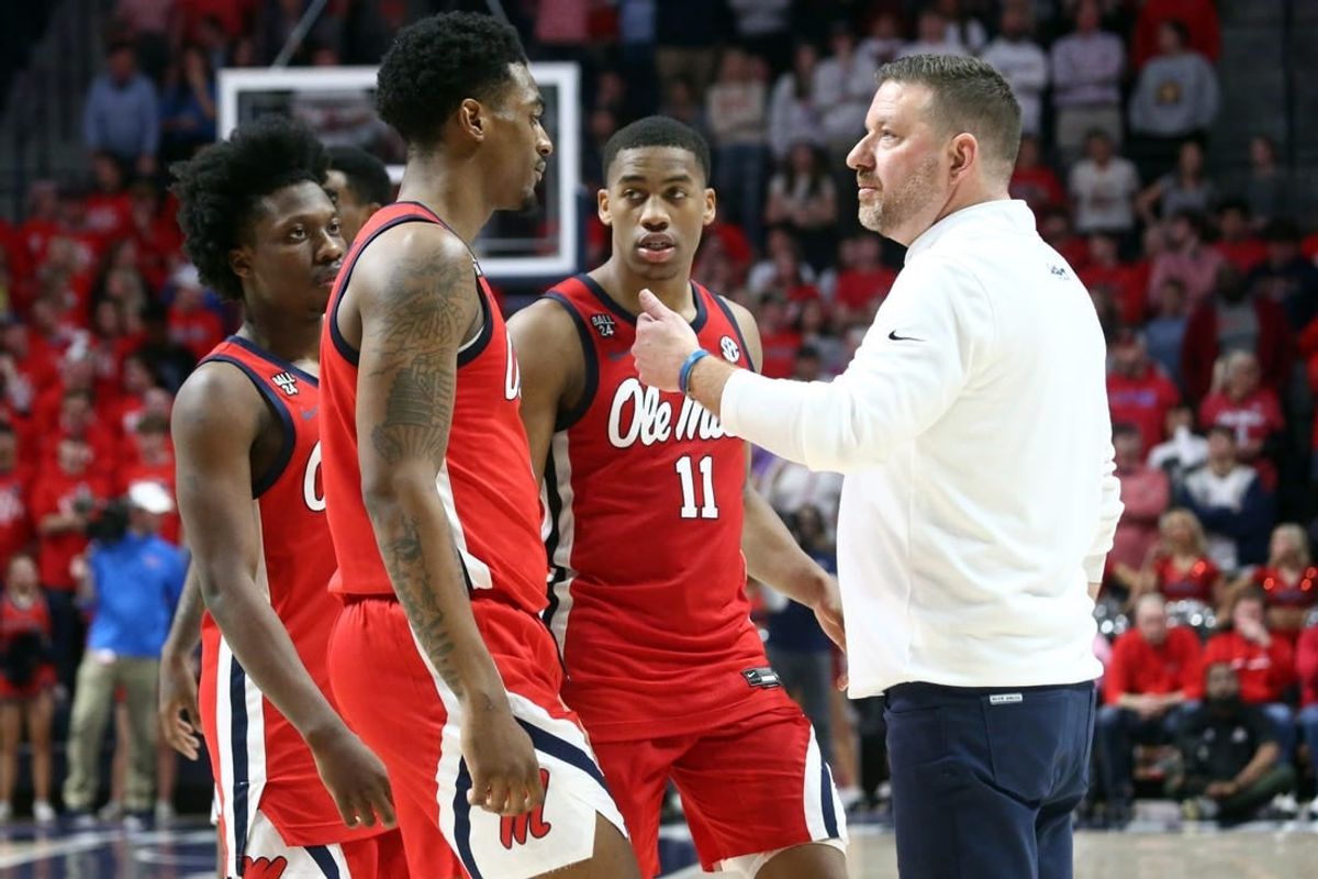 Jan 30, 2024; Oxford, Mississippi, USA; Mississippi Rebels head coach Chris Beard huddles his team near the end of the second half against the Mississippi State Bulldogs at The Sandy and John Black Pavilion at Ole Miss.