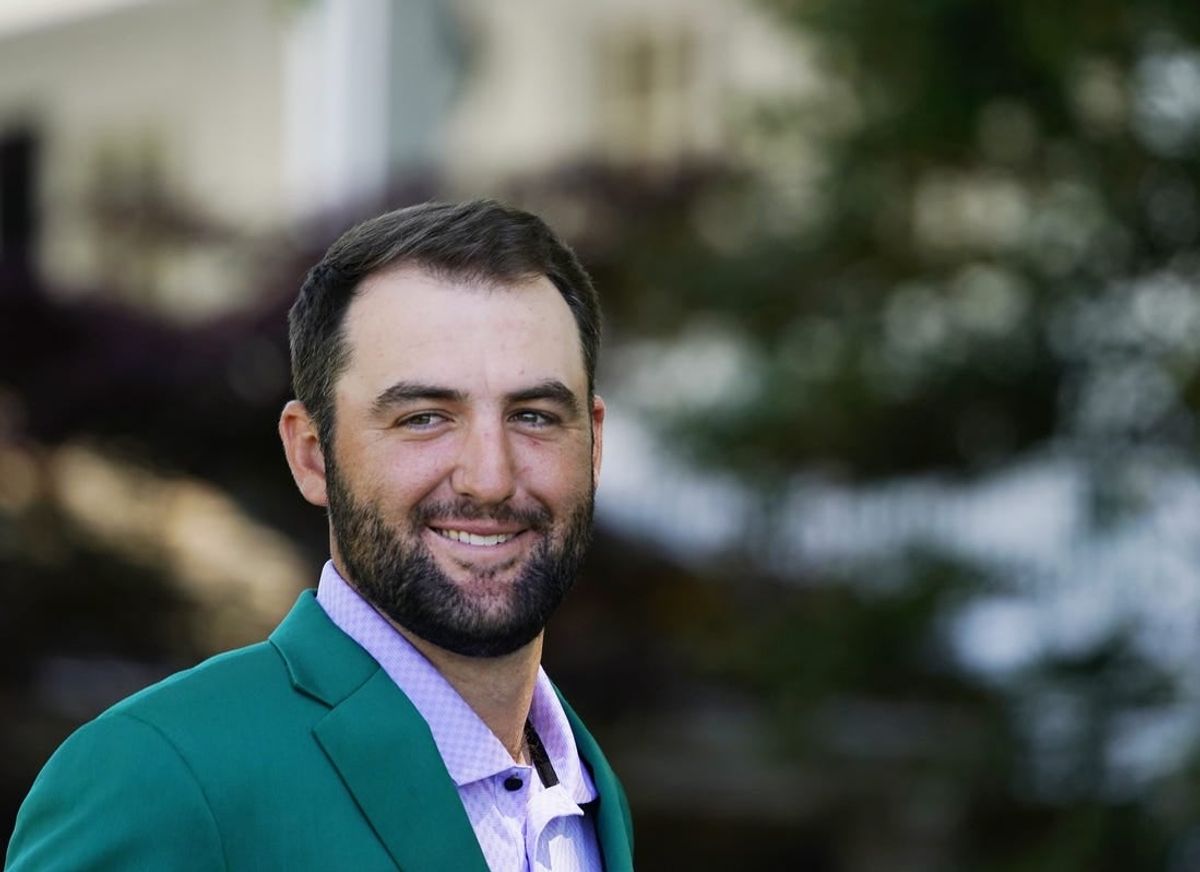 Apr 7, 2024; Augusta, Georgia, USA; Masters champion Scottie Scheffler presents awards during the Drive, Chip & Putt National Finals competition at Augusta National Golf Club.
