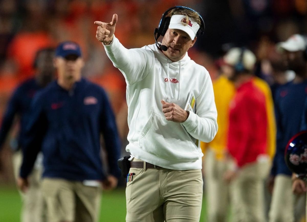 Mississippi Rebels coach Lane Kiffin celebrates a pass interference call as Auburn Tigers take on Mississippi Rebels at Jordan-Hare Stadium in Auburn, Ala., on Saturday, Oct. 21, 2023. Mississippi Rebels defeated Auburn Tigers 28-21.