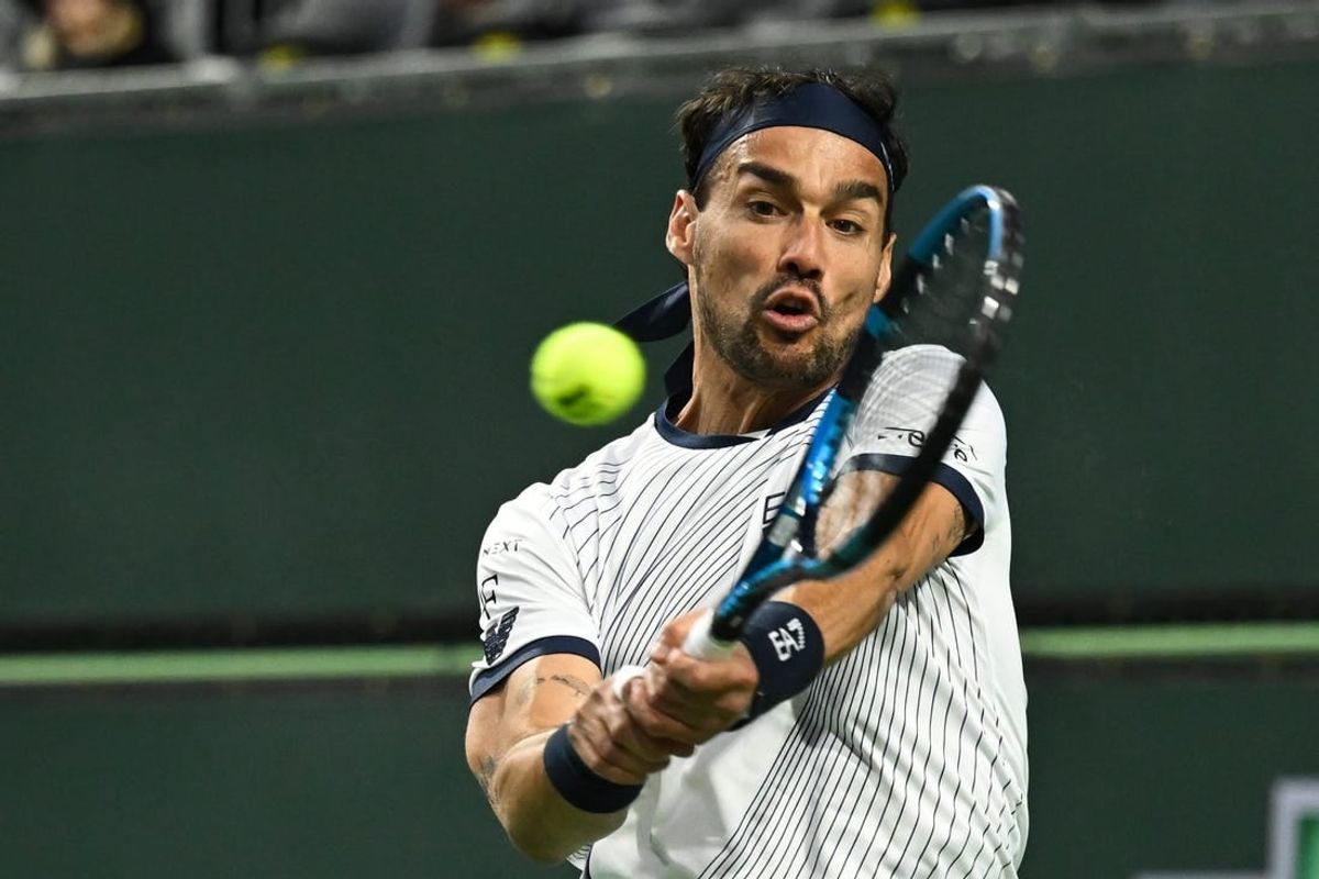 Mar 7, 2024; Indian Wells, CA, USA; Fabio Fognini (ITA) hits a backhand in his first round match against Bernabe Zapata Miralles (ESP) during the BNP Paribas Open at Indian Wells Tennis Garden.