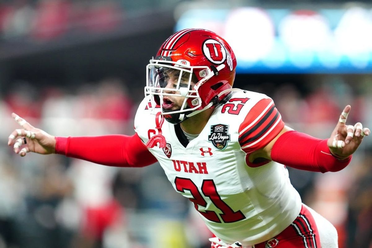 Dec 23, 2023; Las Vagas, NV, USA; Utah Utes linebacker Karene Reid (21) warms up before a game against the Northwestern Wildcats at Allegiant Stadium.