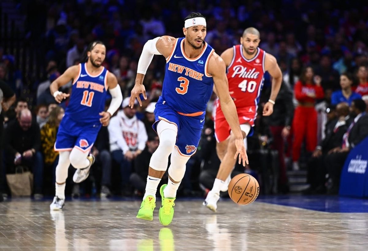 Jan 5, 2024; Philadelphia, Pennsylvania, USA; New York Knicks guard Josh Hart (3) controls the ball against the Philadelphia 76ers in the second quarter at Wells Fargo Center.