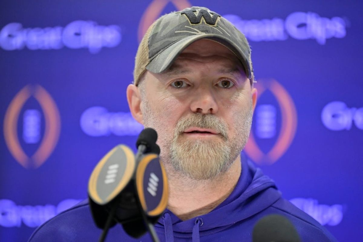 Jan 6, 2024; Houston, TX, USA; Washington Huskies offensive coordinator Ryan Grubb talks to the media during media day before the College Football Playoff national championship game against the Michigan Wolverines at George R Brown Convention Center.