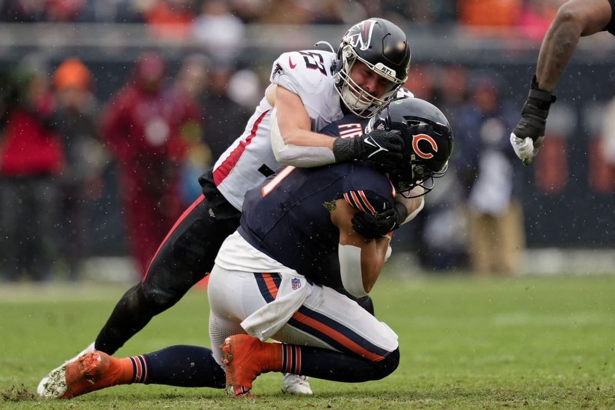 Dec 31, 2023; Chicago, Illinois, USA;  Atlanta Falcons linebacker Nate Landman (53) makes a tackle against the Chicago Bears at Soldier Field.