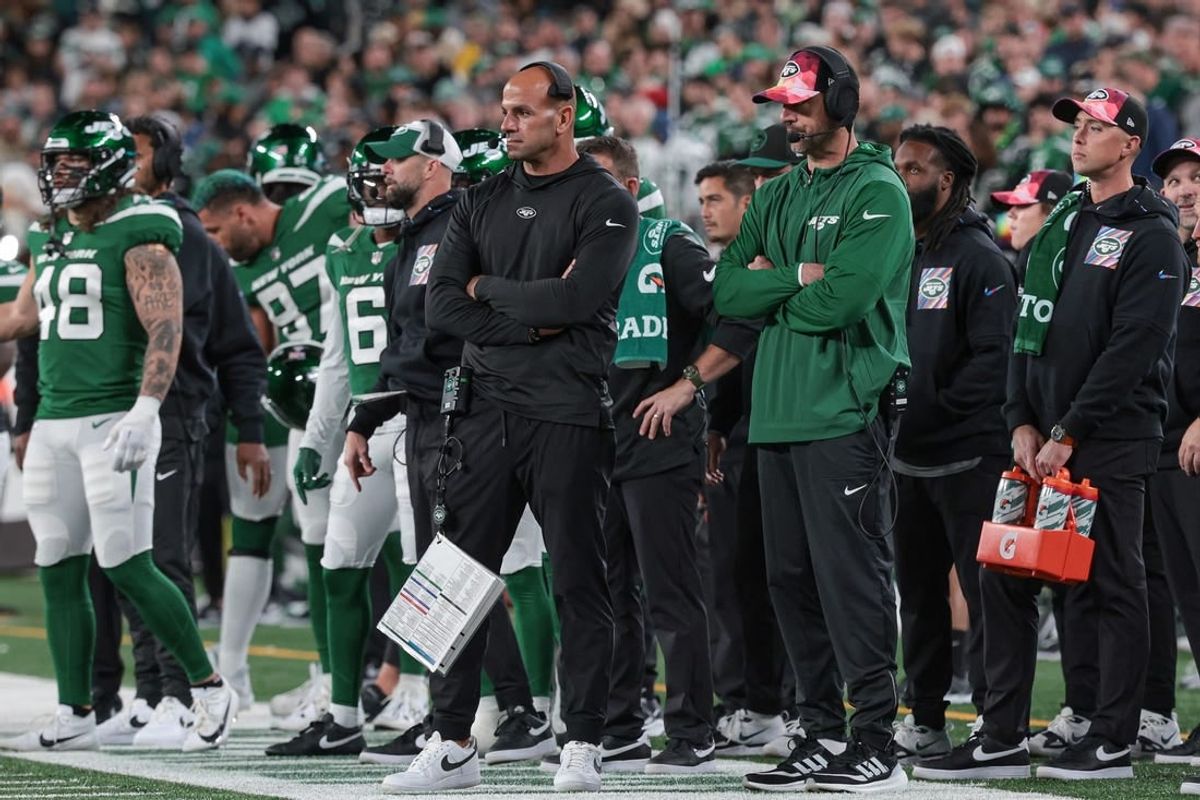 Oct 15, 2023; East Rutherford, New Jersey, USA; New York Jets head coach Robert Saleh (left) an dquarterback Aaron Rodgers (right) looks on during the second half against the Philadelphia Eagles at MetLife Stadium.