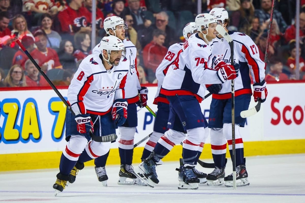 Mar 18, 2024; Calgary, Alberta, CAN; Washington Capitals left wing Alex Ovechkin (8) celebrates his goal with teammates against the Calgary Flames during the second period at Scotiabank Saddledome.