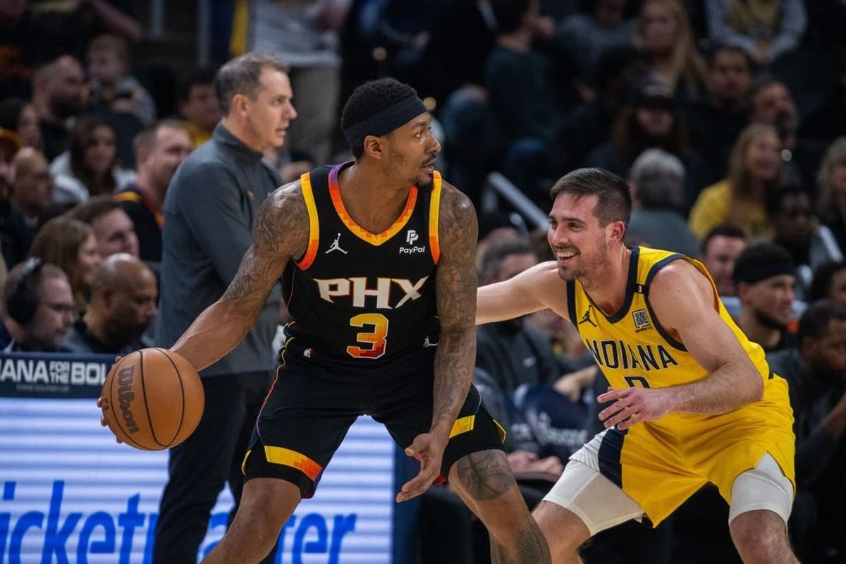 Jan 26, 2024; Indianapolis, Indiana, USA; Phoenix Suns guard Bradley Beal (3) dribbles the ball while Indiana Pacers guard T.J. McConnell (9) defends in the first half at Gainbridge Fieldhouse.