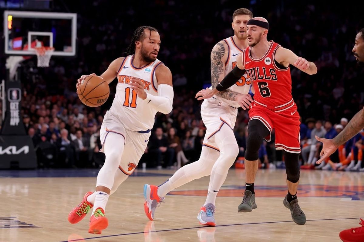 Jan 3, 2024; New York, New York, USA; New York Knicks guard Jalen Brunson (11) drives to the basket against Chicago Bulls guard Alex Caruso (6) during the first quarter at Madison Square Garden.