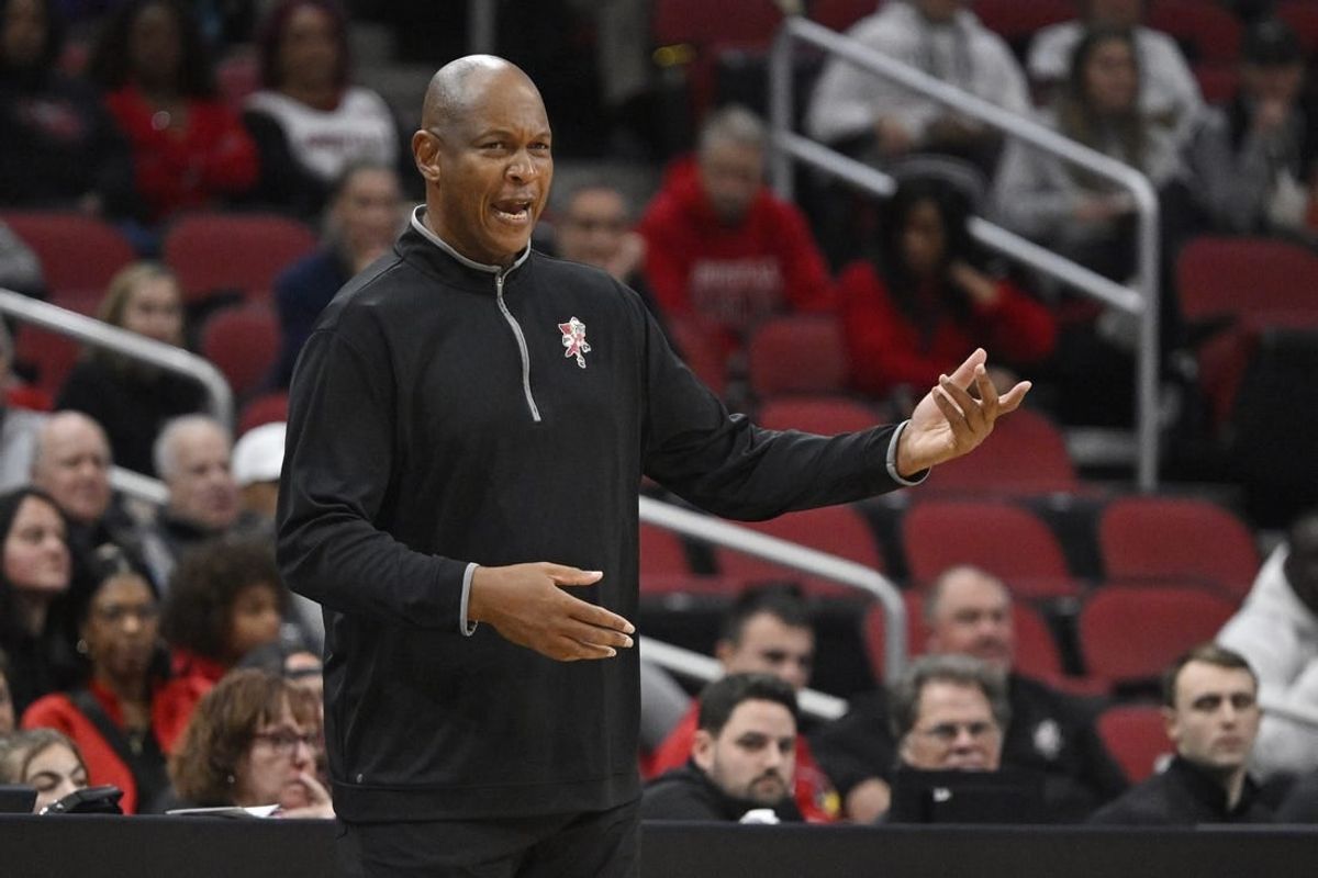 Nov 26, 2023; Louisville, Kentucky, USA; Louisville Cardinals head coach Kenny Payne coaches during the first half against the New Mexico State Aggies at KFC Yum! Center.