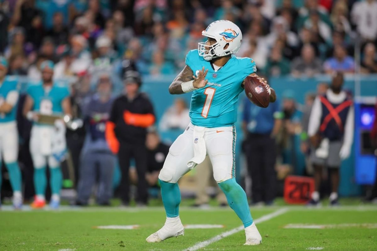 Dec 11, 2023; Miami Gardens, Florida, USA; Miami Dolphins quarterback Tua Tagovailoa (1) throws the football against the Tennessee Titans during the third quarter at Hard Rock Stadium.