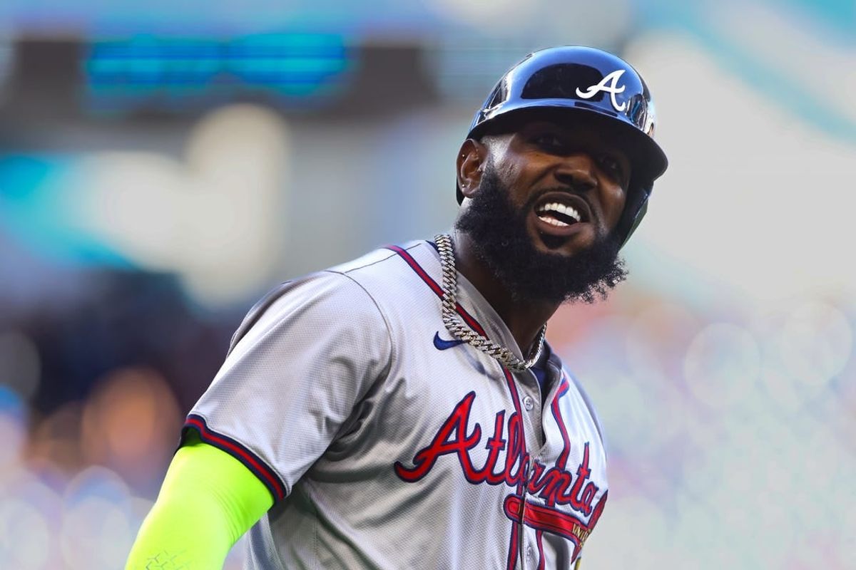 Apr 14, 2024; Miami, Florida, USA; Atlanta Braves designated hitter Marcell Ozuna (20) reacts after hitting a two-run home run against the Miami Marlins during the ninth inning at loanDepot Park.