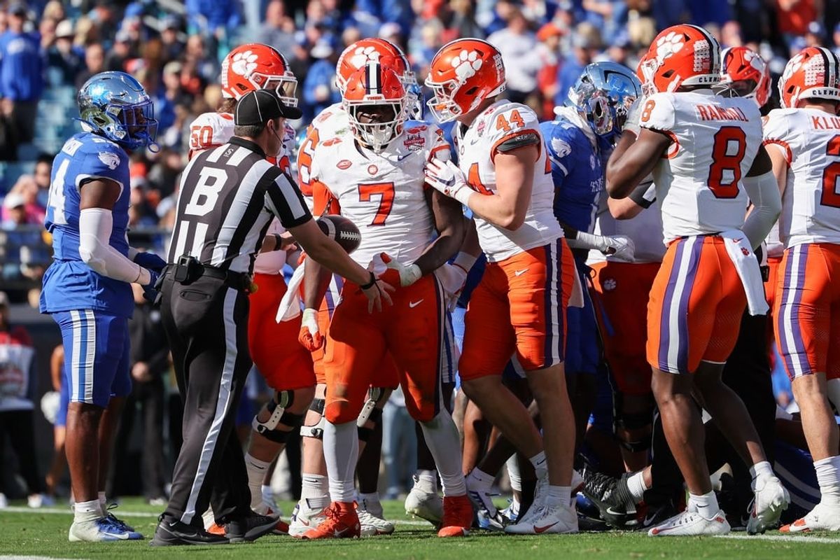 Dec 29, 2023; Jacksonville, FL, USA;  Clemson Tigers running back Phil Mafah (7) runs the ball into the end zone for a touchdown against the Kentucky Wildcats in the second quarter during the Gator Bowl at EverBank Stadium.