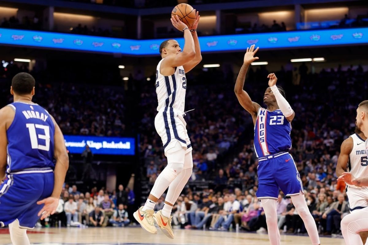 Mar 18, 2024; Sacramento, California, USA; Memphis Grizzlies guard Desmond Bane (22) shoots the ball against Sacramento Kings guard Keon Ellis (23) during the fourth quarter  at Golden 1 Center.