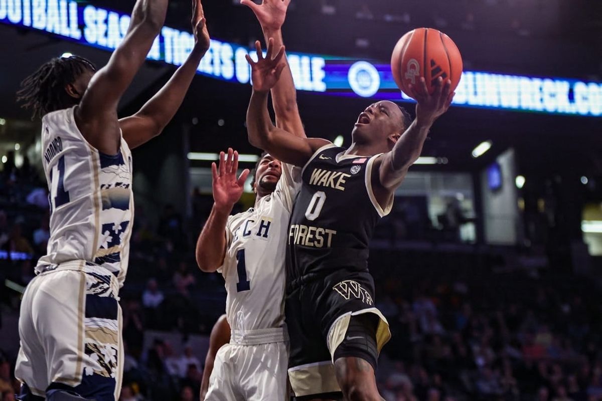 Feb 6, 2024; Atlanta, Georgia, USA; Wake Forest Demon Deacons guard Kevin Miller (0) shoots against the Georgia Tech Yellow Jackets in the first half at McCamish Pavilion.