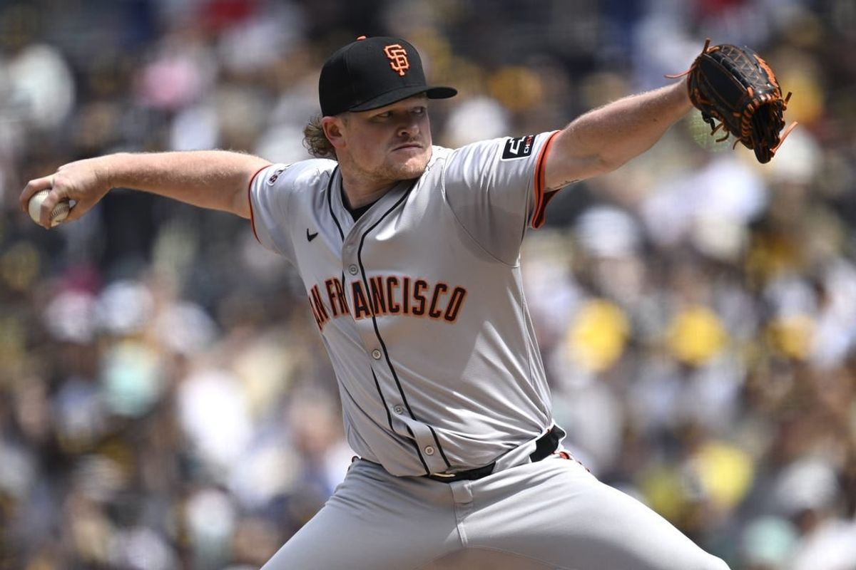 Mar 28, 2024; San Diego, California, USA; San Francisco Giants starting pitcher Logan Webb (62) throws a pitch against the San Diego Padres during the first inning at Petco Park.