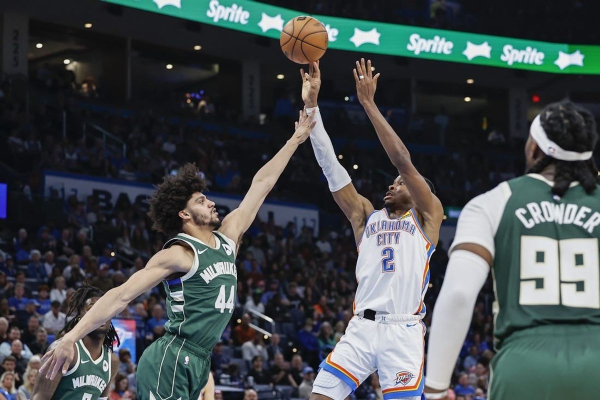 Apr 12, 2024; Oklahoma City, Oklahoma, USA; Oklahoma City Thunder guard Shai Gilgeous-Alexander (2) shoots as Milwaukee Bucks guard Andre Jackson Jr. (44) defends the basket during the fourth quarter at Paycom Center.