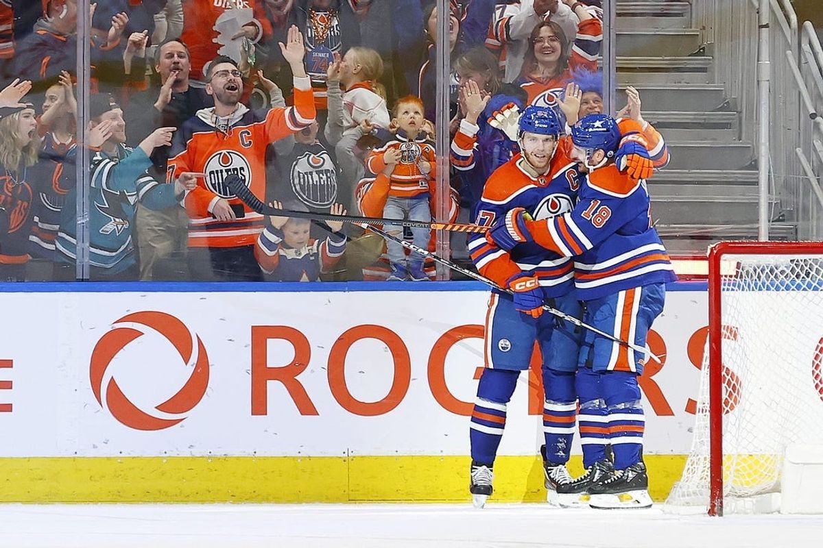 Apr 15, 2024; Edmonton, Alberta, CAN; The Edmonton Oilers celebrate a goal scored by forward Zach Hyman (18), during the second period against the San Jose Sharks at Rogers Place. The goal was assisted by forward Connor McDavid (97), his 100th of the season making him only the fourth player in NHL history history to record 100 assists in a single season.