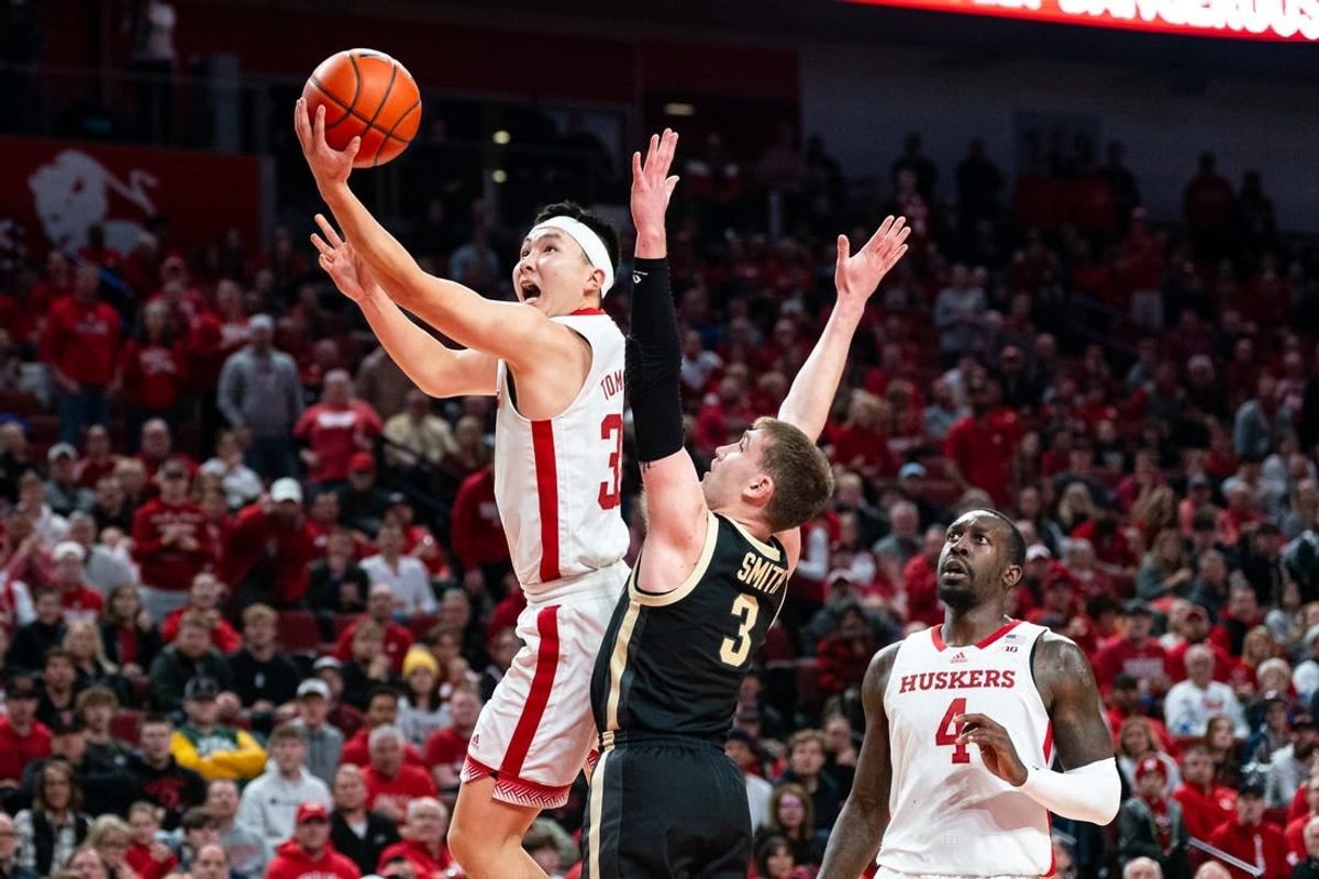 Jan 9, 2024; Lincoln, Nebraska, USA; Nebraska Cornhuskers guard Keisei Tominaga (30) shoots the ball against Purdue Boilermakers guard Braden Smith (3) during the first half at Pinnacle Bank Arena.