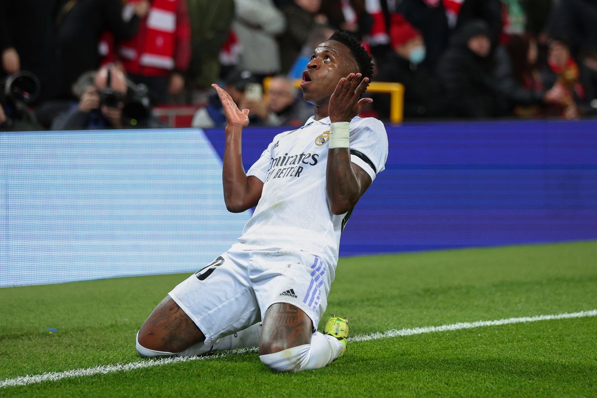 Vinicius Junior of Real Madrid celebrates scoring his second goal against Liverpool.