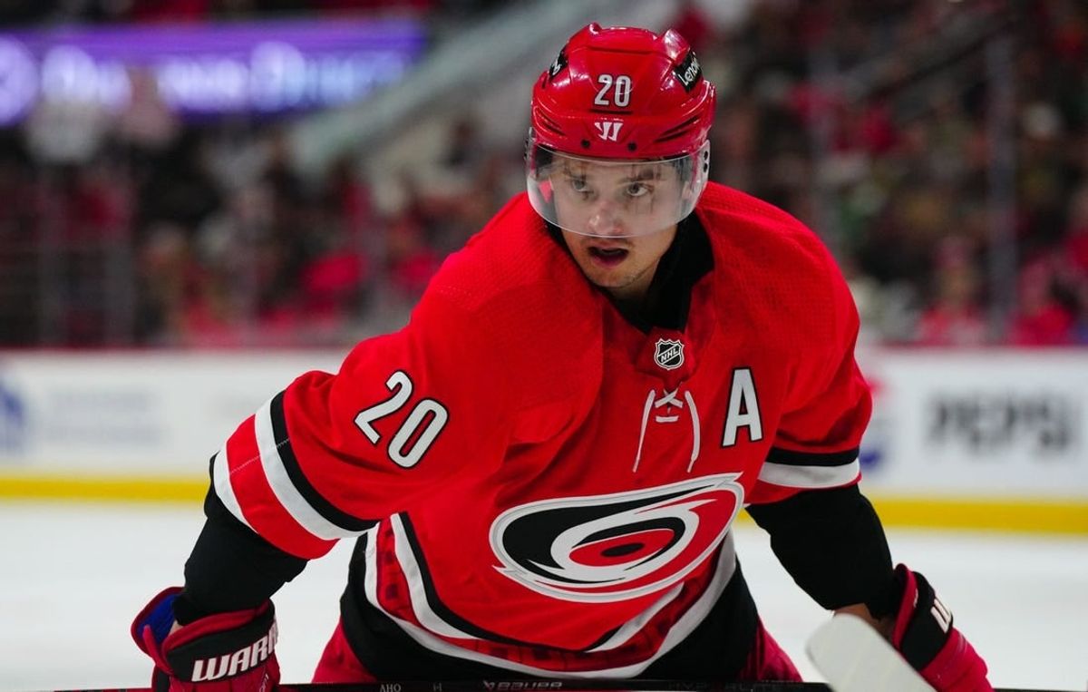 Nov 26, 2023; Raleigh, North Carolina, USA; Carolina Hurricanes center Sebastian Aho (20) looks on during the third period against the Columbus Blue Jackets at PNC Arena.