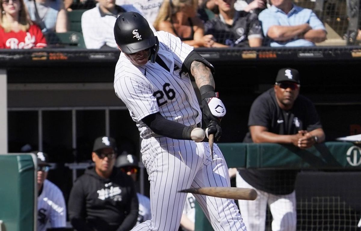 Apr 14, 2024; Chicago, Illinois, USA; Chicago White Sox catcher Korey Lee (26) breaks his bat as he pops out to Cincinnati Reds first base Christian Encarnacion-Strand (not pictured) during the seventh inning at Guaranteed Rate Field.