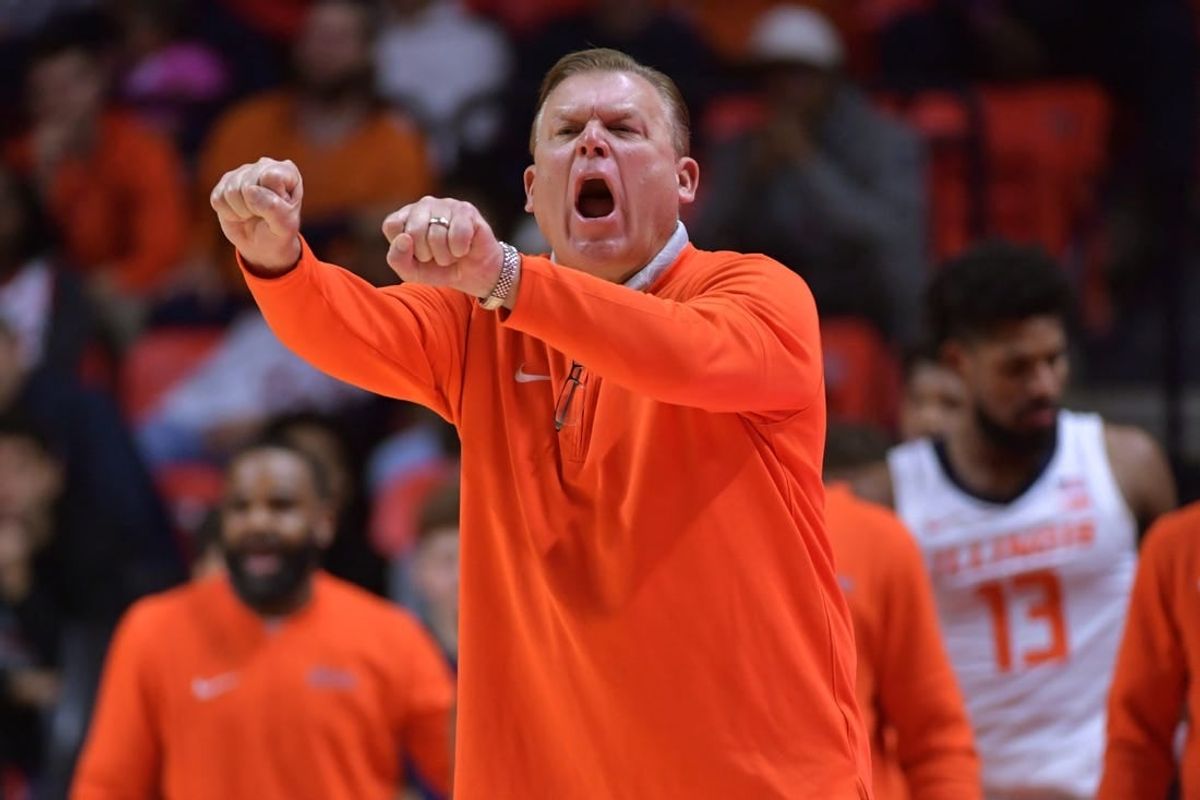 Nov 10, 2023; Champaign, Illinois, USA;  Illinois Fighting Illini head coach Brad Underwood reacts off the bench during the first half against the Oakland Golden Grizzlies at State Farm Center.