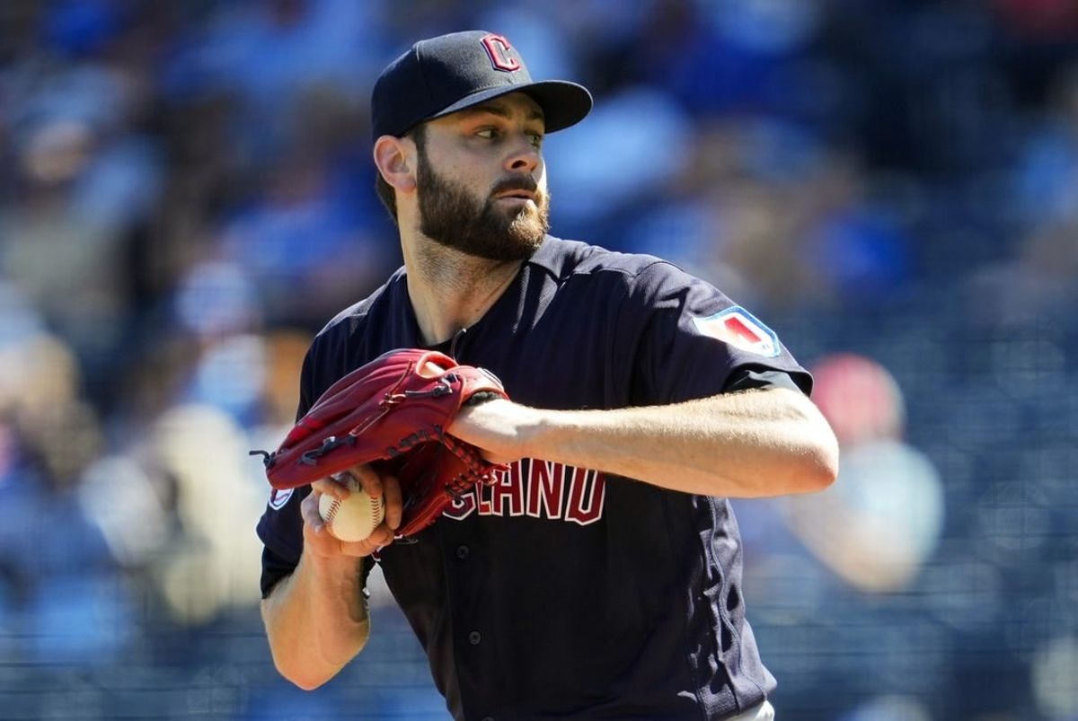 Sep 20, 2023; Kansas City, Missouri, USA; Cleveland Guardians starting pitcher Lucas Giolito (27) pitches during the first inning against the Kansas City Royals at Kauffman Stadium.
