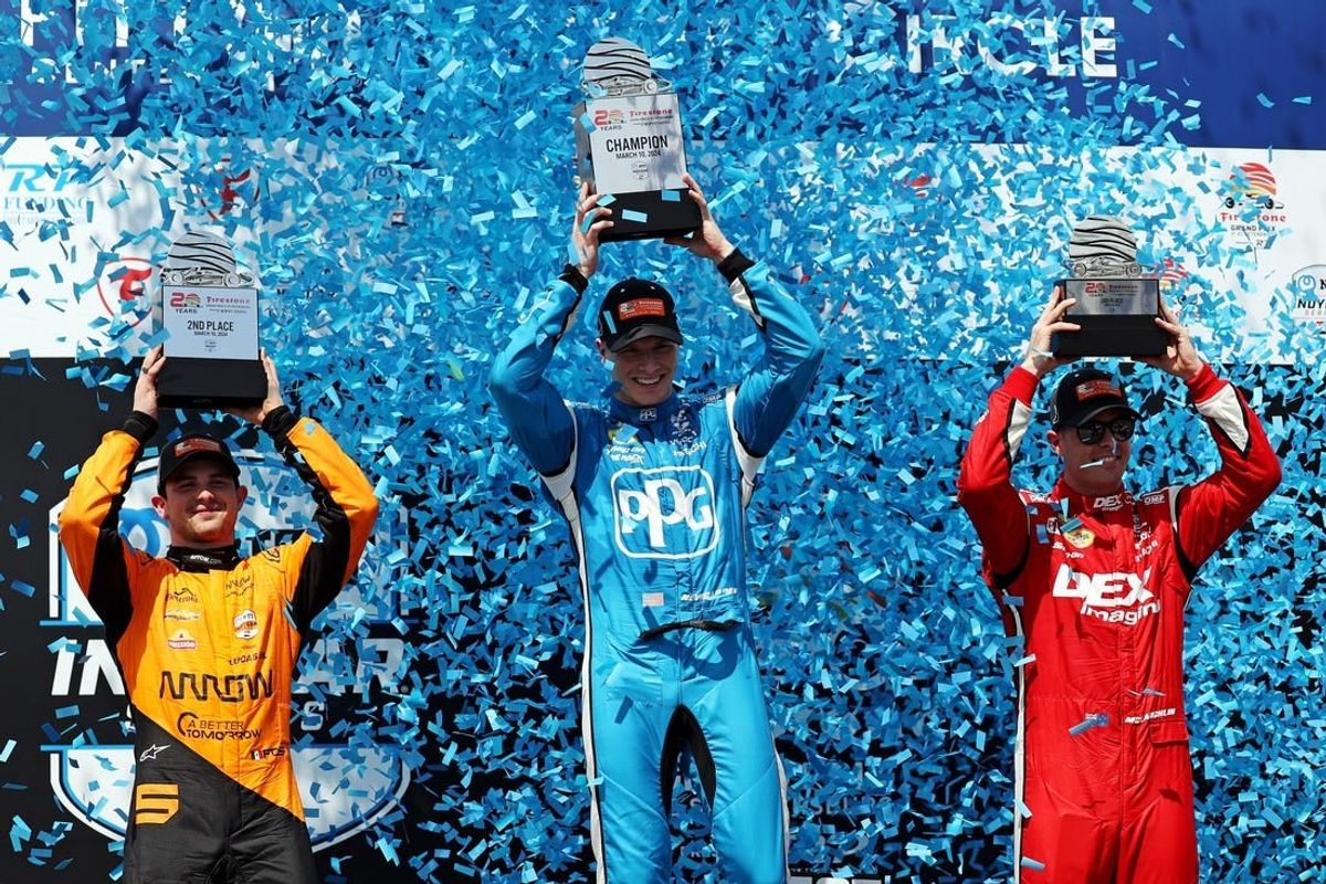 Mar 10, 2024; St. Petersburg, Florida, USA; Indycar driver Josef Newgarden (middle) celebrates winning the Grand Prix of St. Petersburg. Indycar driver Patricio O'Ward (left) celebrates winning second and Indycar driver Scott McLaughlin (right) celebrates winning third