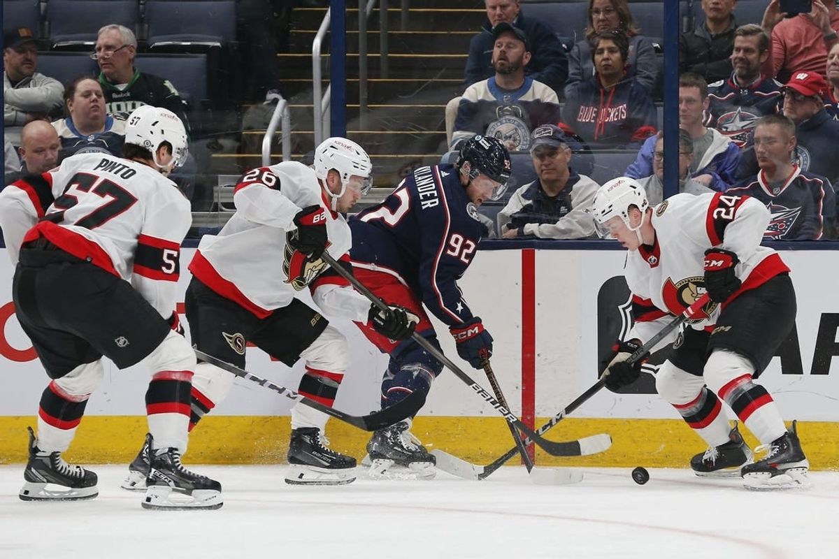 Mar 14, 2024; Columbus, Ohio, USA; Columbus Blue Jackets left wing Alexander Nylander (92) battles with Ottawa Senators defenseman Jacob Bernard-Docker (24) for the puck during the first period at Nationwide Arena.
