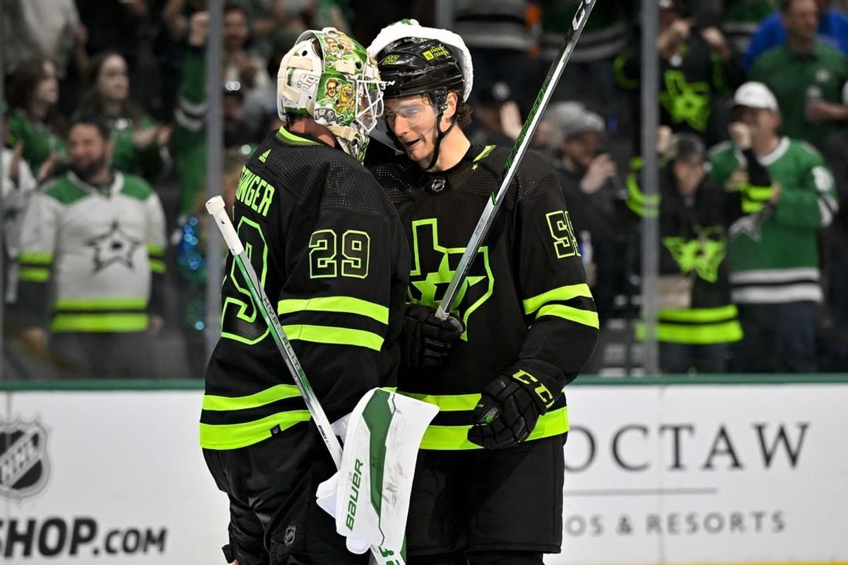 Apr 3, 2024; Dallas, Texas, USA; Dallas Stars goaltender Jake Oettinger (29) and defenseman Thomas Harley (55) celebrate on the ice after the Stars defeat the Edmonton Oilers at the American Airlines Center.