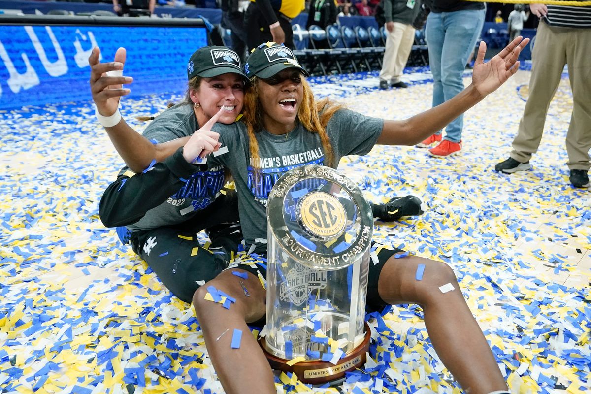 Kentucky’s  Rhyne  Howard,  right,  and  Blair  Green  celebrate  after  Kentucky  beat  South  Carolina  to  win  the  NCAA  women’s  college  basketball  Southeastern  Conference  tournament  championship  game.