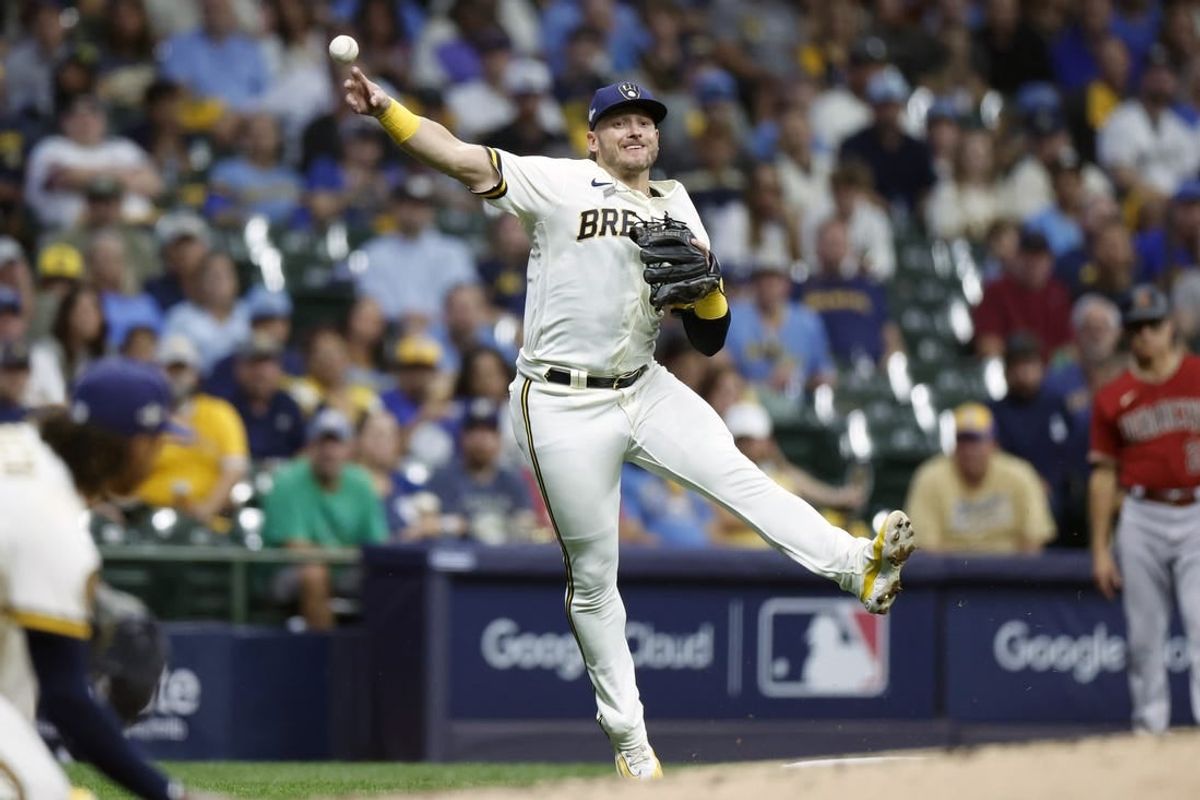 Oct 4, 2023; Milwaukee, Wisconsin, USA; Milwaukee Brewers third baseman Josh Donaldson (3) throws to first in the fourth inning against the Arizona Diamondbacks during game two of the Wildcard series for the 2023 MLB playoffs at American Family Field.