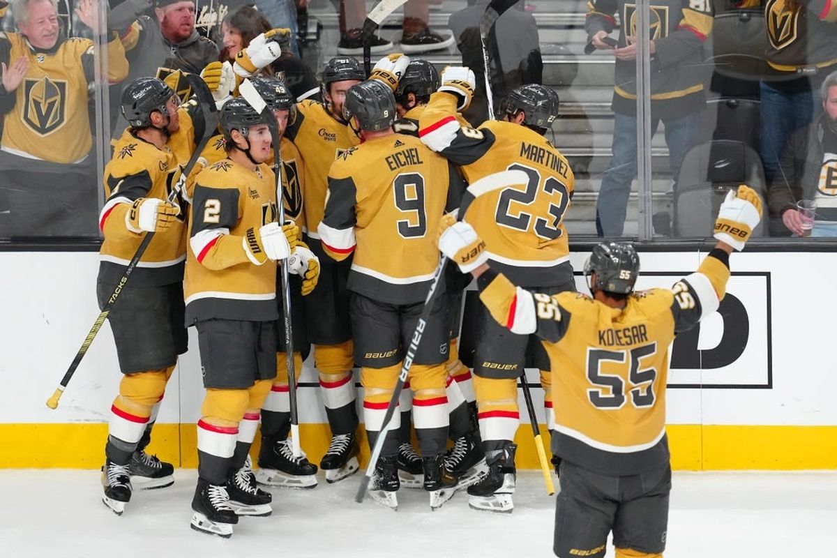 Jan 11, 2024; Las Vegas, Nevada, USA; Vegas Golden Knights players celebrate after Vegas Golden Knights defenseman Alex Pietrangelo (7) scored a goal against the Boston Bruins in overtime to give the Golden Knights a 2-1 victory at T-Mobile Arena.