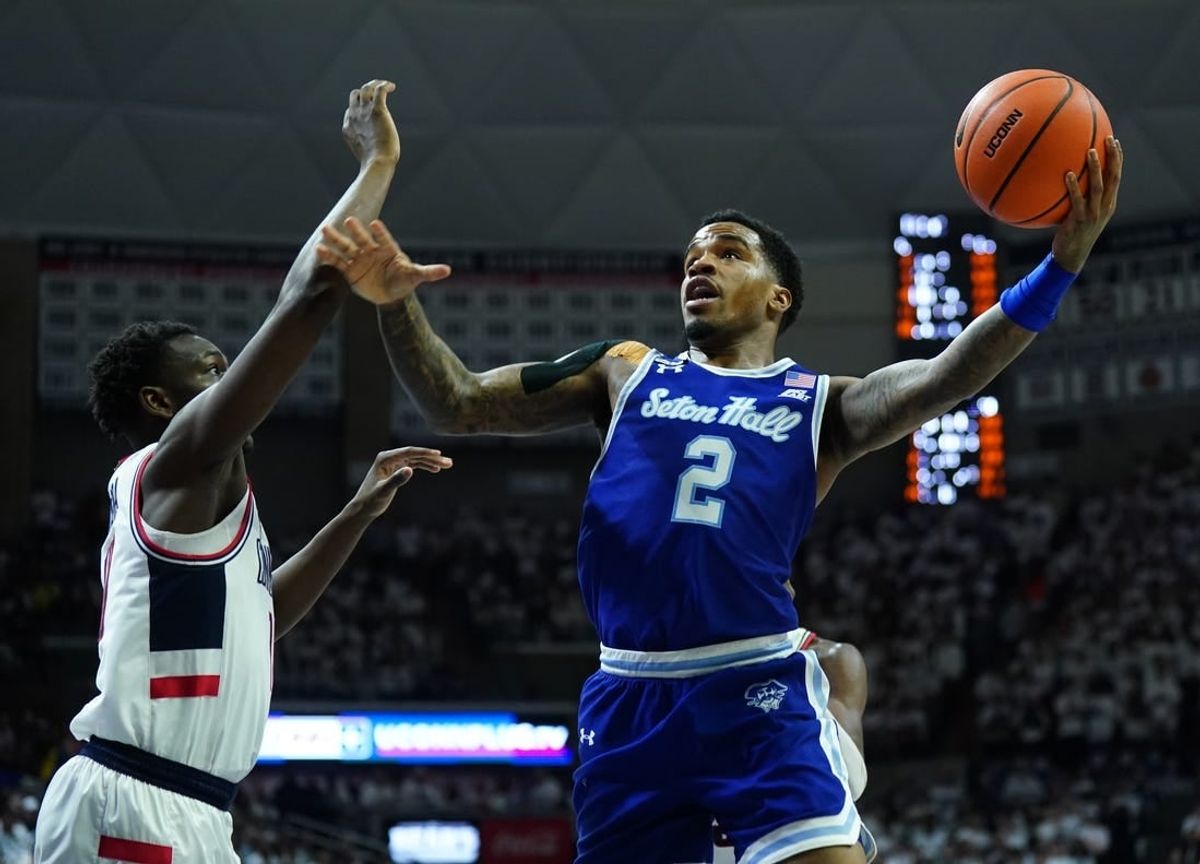Mar 3, 2024; Storrs, Connecticut, USA; Seton Hall Pirates guard Al-Amir Dawes (2) shoots against UConn Huskies guard Hassan Diarra (10) in the first half at Harry A. Gampel Pavilion.