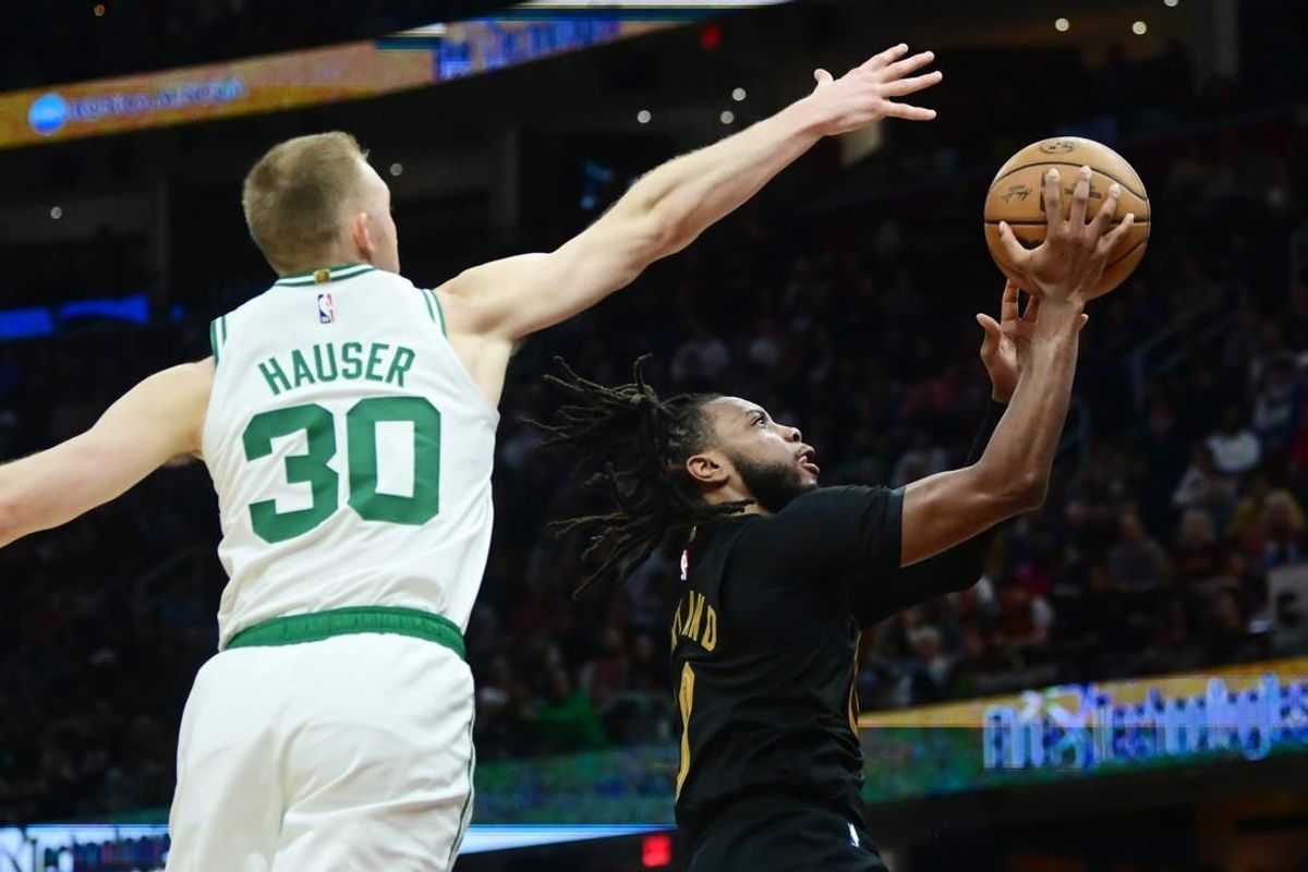 Mar 5, 2024; Cleveland, Ohio, USA; Cleveland Cavaliers guard Darius Garland (10) drives to the basket against Boston Celtics forward Sam Hauser (30) during the second half at Rocket Mortgage FieldHouse.