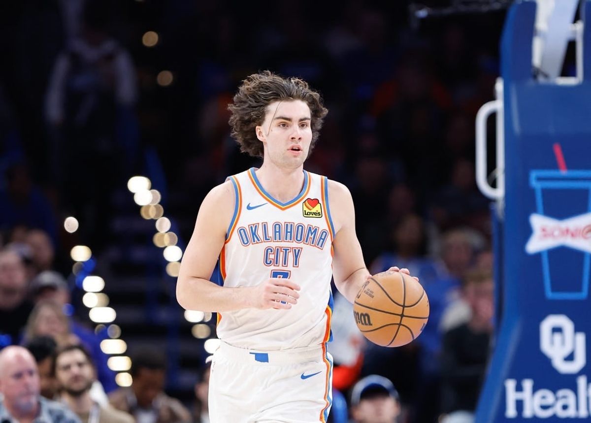 Nov 25, 2023; Oklahoma City, Oklahoma, USA; Oklahoma City Thunder guard Josh Giddey (3) dribbles the ball up the court against the Philadelphia 76ers during the second half at Paycom Center.