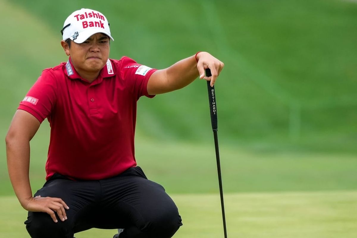 Peiyun Chien, of Pingtung, Chinese Taipei, reads her putt on the 18th hole at the 2023 Kroger Queen City Championship presented by P&G at Kenwood Country Club in Madeira, Ohio, on Saturday, Sept. 9, 2023. Chien finished 13 under.