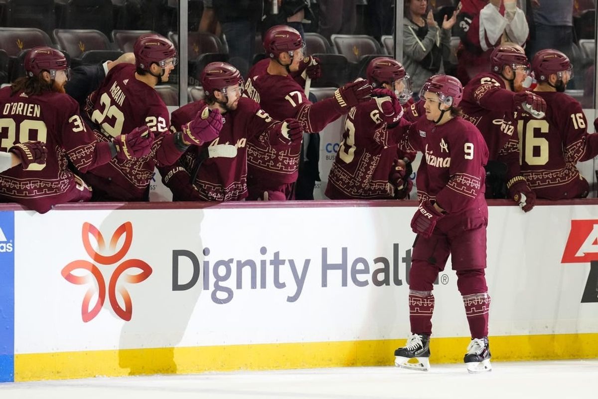 Jan 20, 2024; Tempe, Arizona, USA; Arizona Coyotes right wing Clayton Keller (9) celebrates his goal against the Nashville Predators during the first period at Mullett Arena.